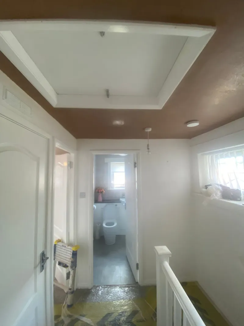 Bathroom ceiling covered over the old artex and finished smooth