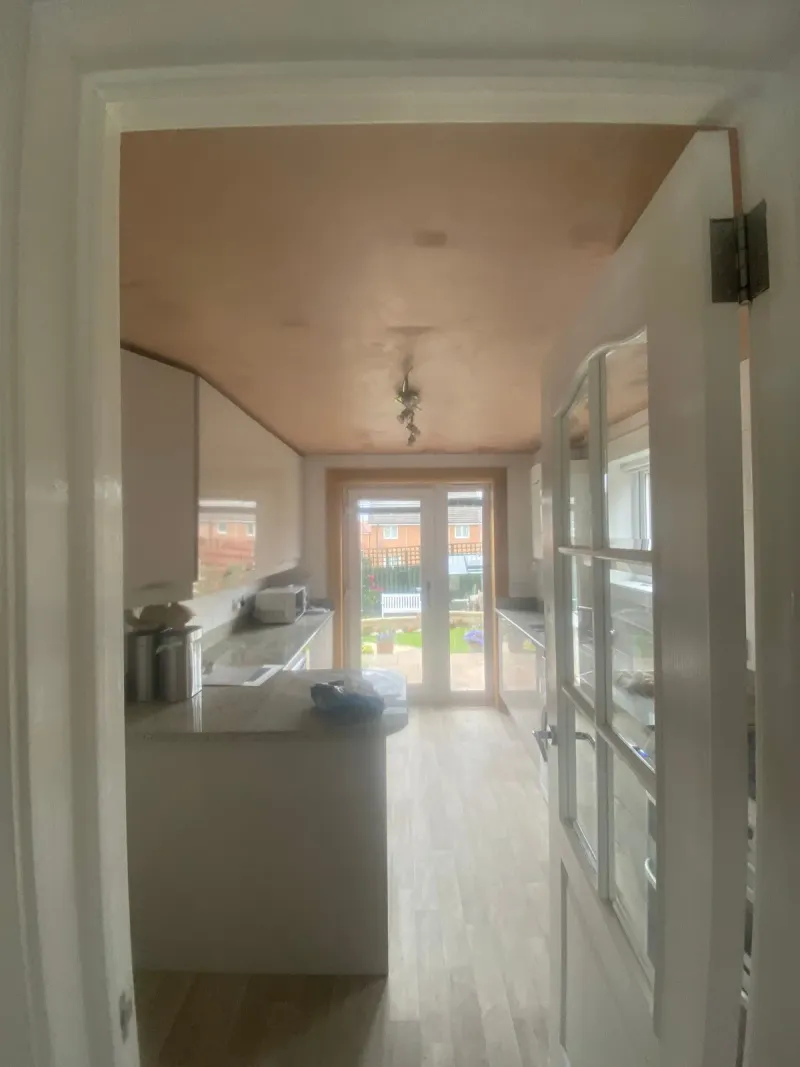Kitchen diner ceiling covered over the old artex and finished smooth