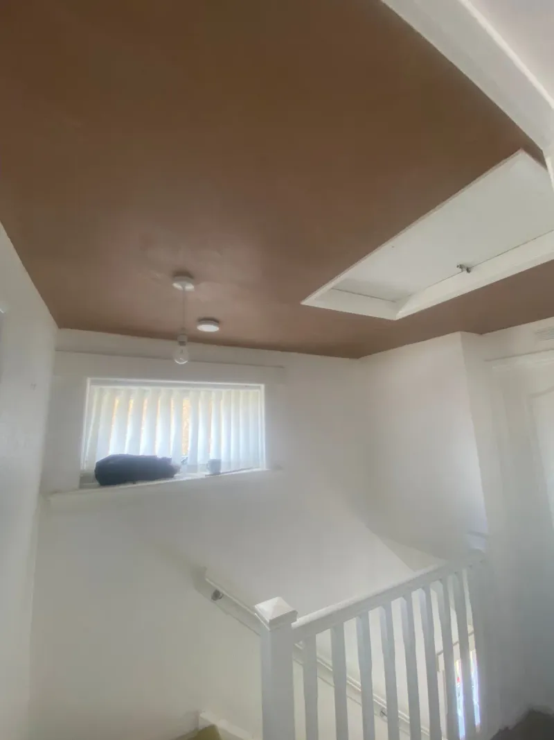 Landing ceiling covered over the old artex and finished smooth