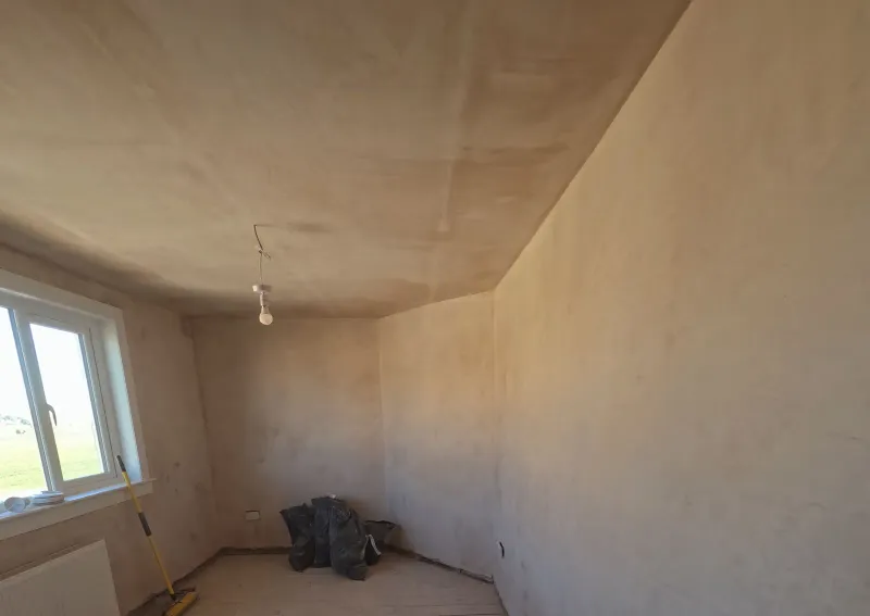 Bedroom walls bonded and skimmed flat, ready for decorating