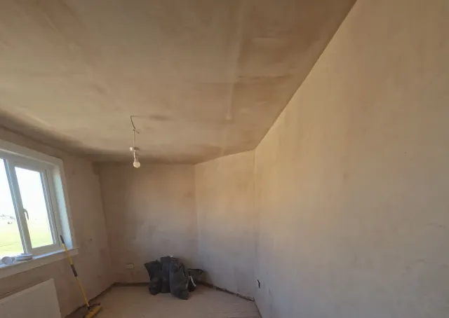 Bedroom walls bonded and skimmed flat, ready for decorating