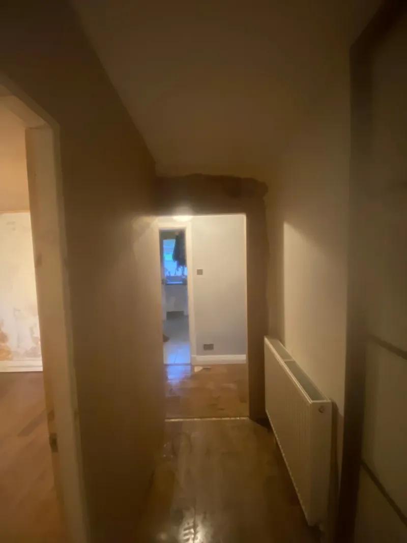 Hallway doorway patched and plastered after alterations